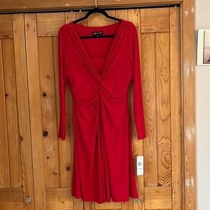 Red long sleeve dress, knee lengthish (depending on height).